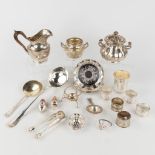 A various collection of silver table accessories and items. 1652g.