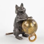 An antique tape measure, in the shape of a cat with a ball, Vienna bronze. 19th century. (H: 4,2 cm)
