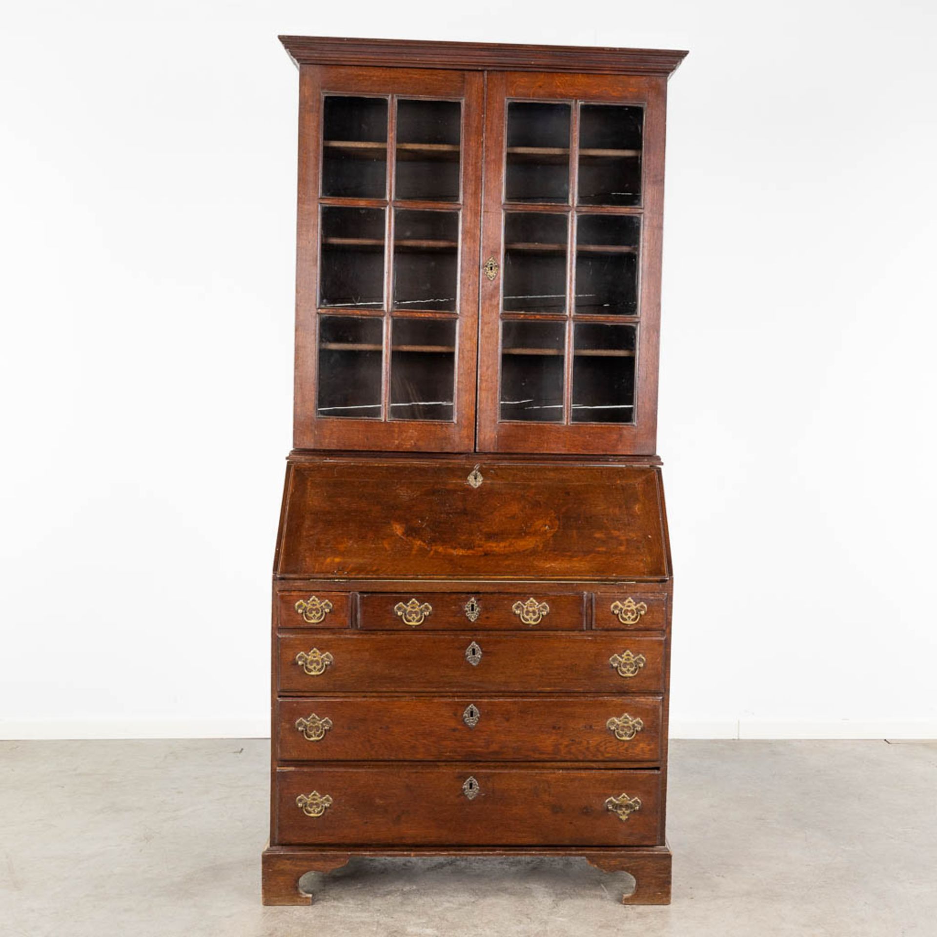 A secretaire with a display cabinet/library, oak, 19th C. (L: 98 x W: 57 x H: 212 cm)