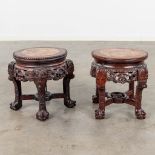 A pair of Chinese hardwood pedestals with a marble top. (L: 36 x W: 36 x H: 34 cm)