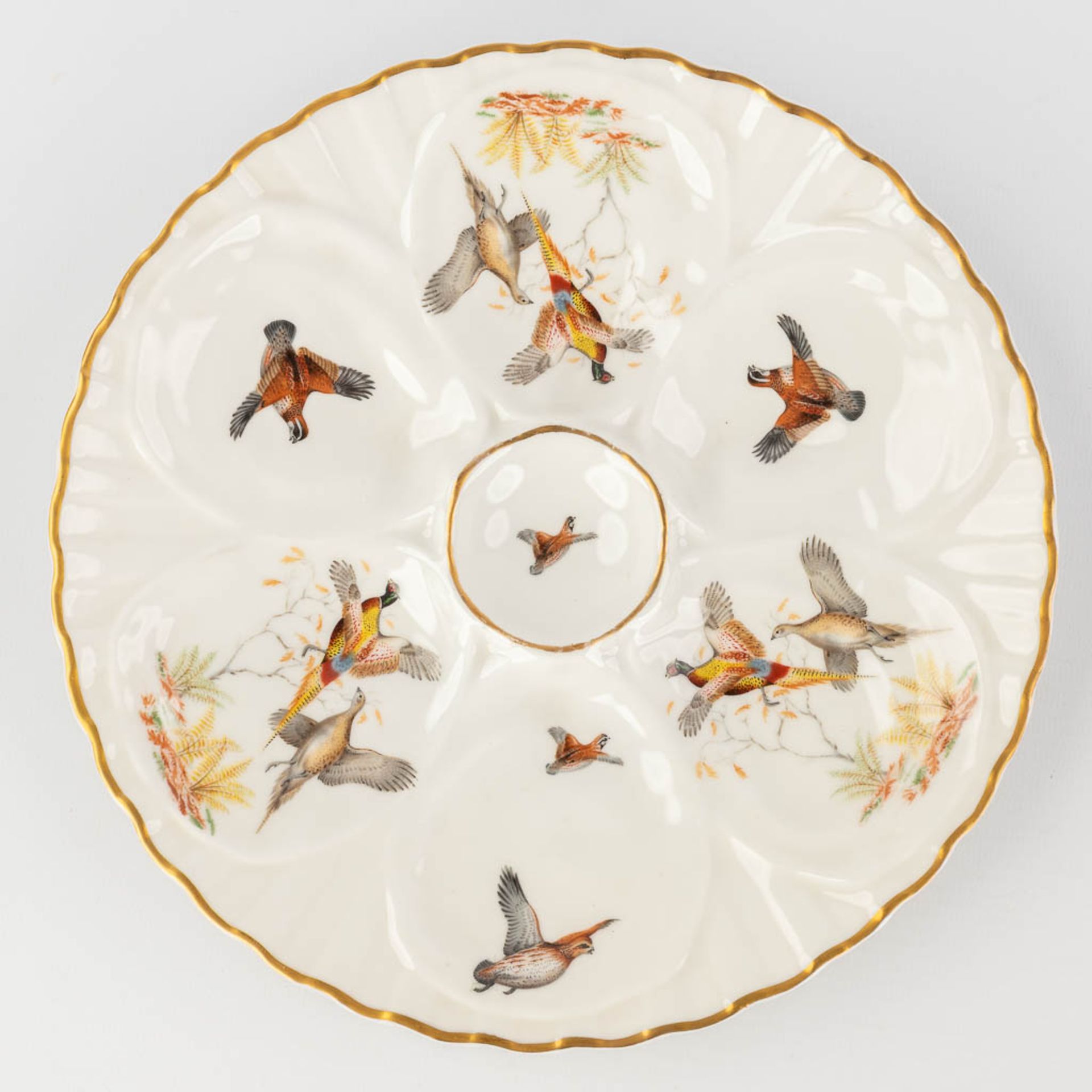 Porcelaine De Paris, France, a collection of 12 oyster plates decorated with birds. 20th C. (D: 23 c - Image 9 of 14