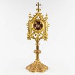A sealed theca with relic 'De Spongia DNJC' in a bronze monstrance in a gothic revival style. 1858.
