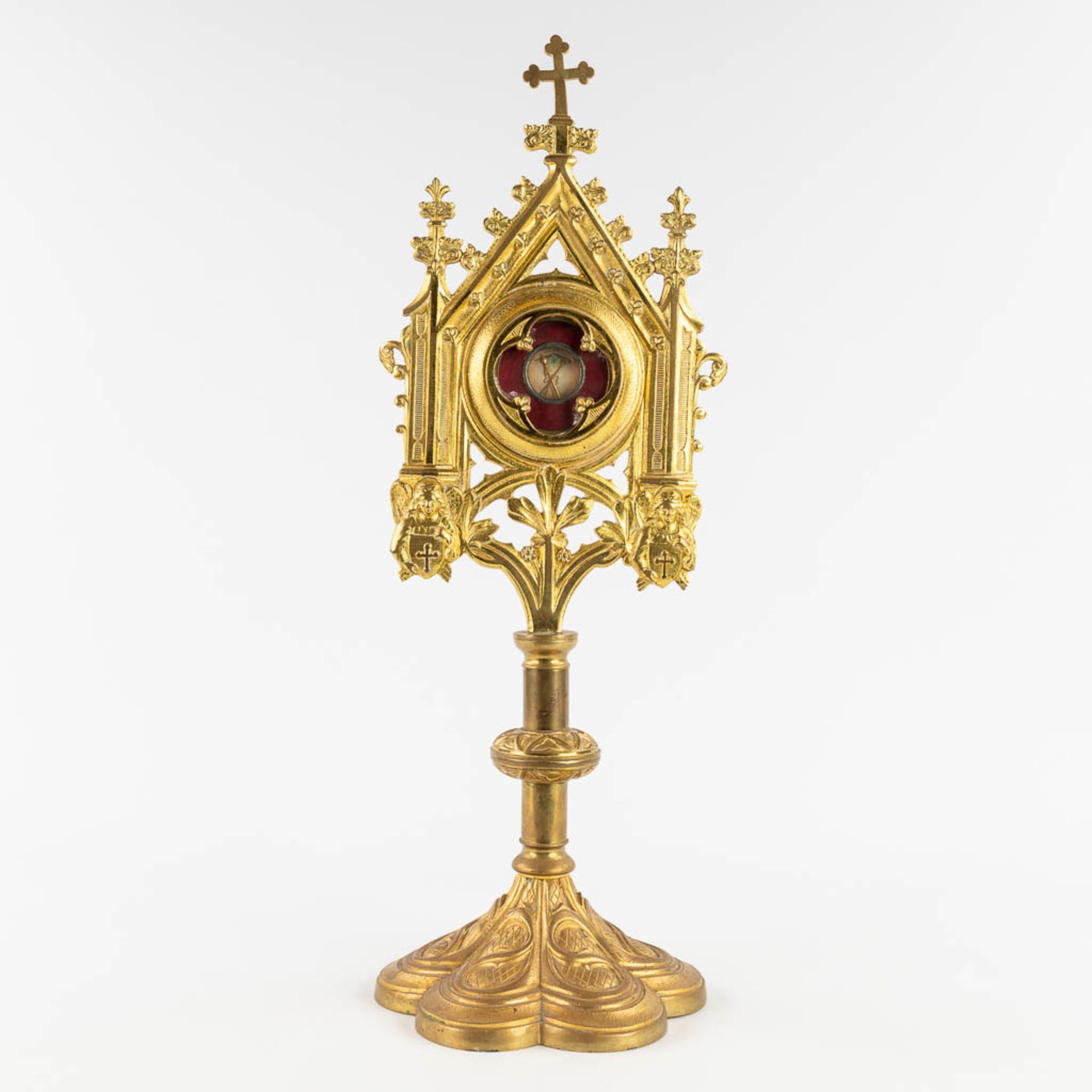 A sealed theca with relic 'De Spongia DNJC' in a bronze monstrance in a gothic revival style. 1858.