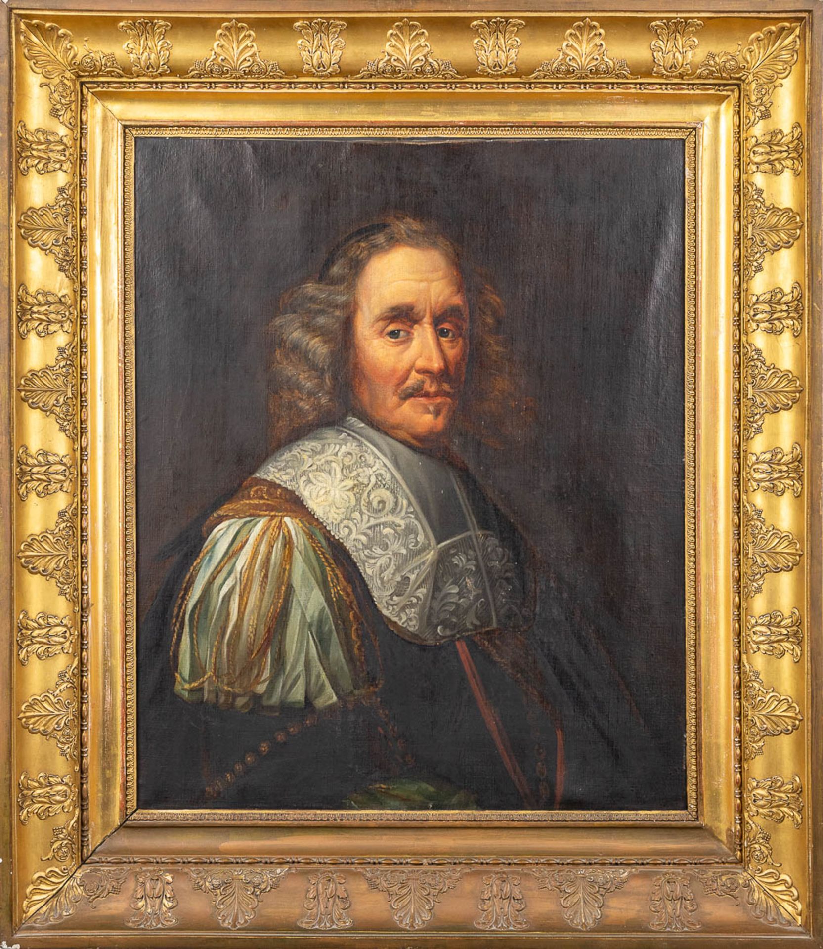 An antique portrait, oil on canvas. Framed in an empire-style frame. 19th century. (W: 59 x H: 72 cm