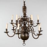 A Flemish candle chandelier, crowned madonna with child, 12 points of light. Bronze. 19th C. (H: 90