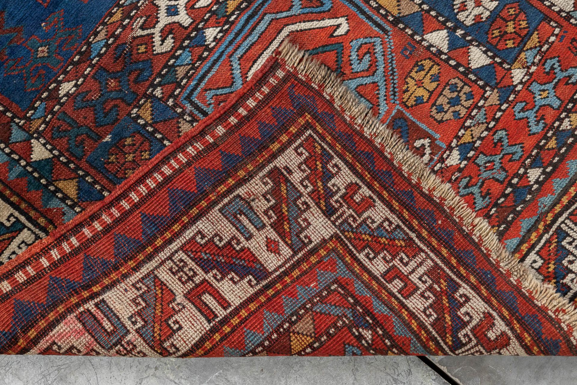 A collection of 3 Oriental hand-made carpets, probably Caucasian. (L: 157 x W: 116 cm) - Image 9 of 11