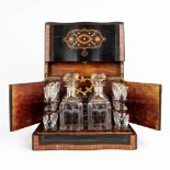 A tantalus 'Cave ˆ Liqueur' in a wood box finished with marquetry inlay. Napoleon 3. (L: 25 x W: 33