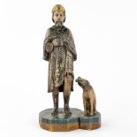 An antique wood sculpture 'Saint Rochus and his dog'. 19th C. (L: 14 x W: 19,5 x H: 37 cm)