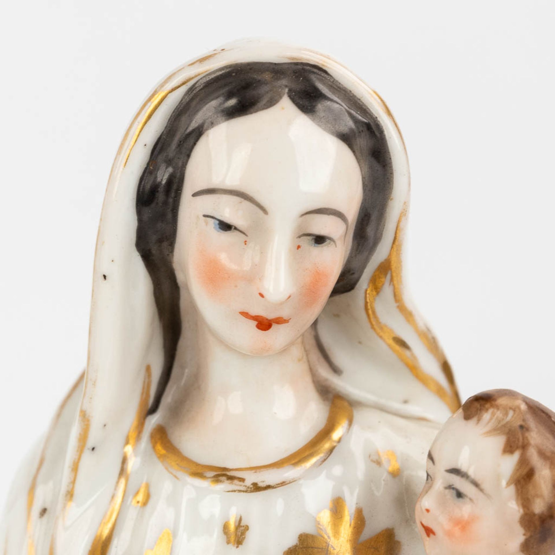 A porcelain figurine of Mary and Joseph, made in Andenne, Belgium. (H: 32 cm) - Image 12 of 13