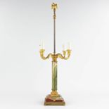 A table lamp, brass and onyx. 20th century. (L: 30 x W: 30 x H: 77 cm)