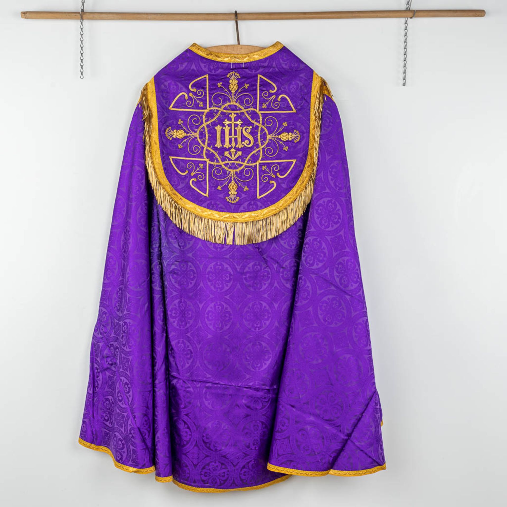 A Cope and Humeral Veil, finished with thick gold thread and purple fabric and the IHS logo. - Image 7 of 12
