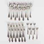 A collection of 29 pieces of silver cutlery. 1060g