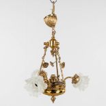 A chandelier, brass with glass lampshades, circa 1970. (H: 60 x D: 40 cm)