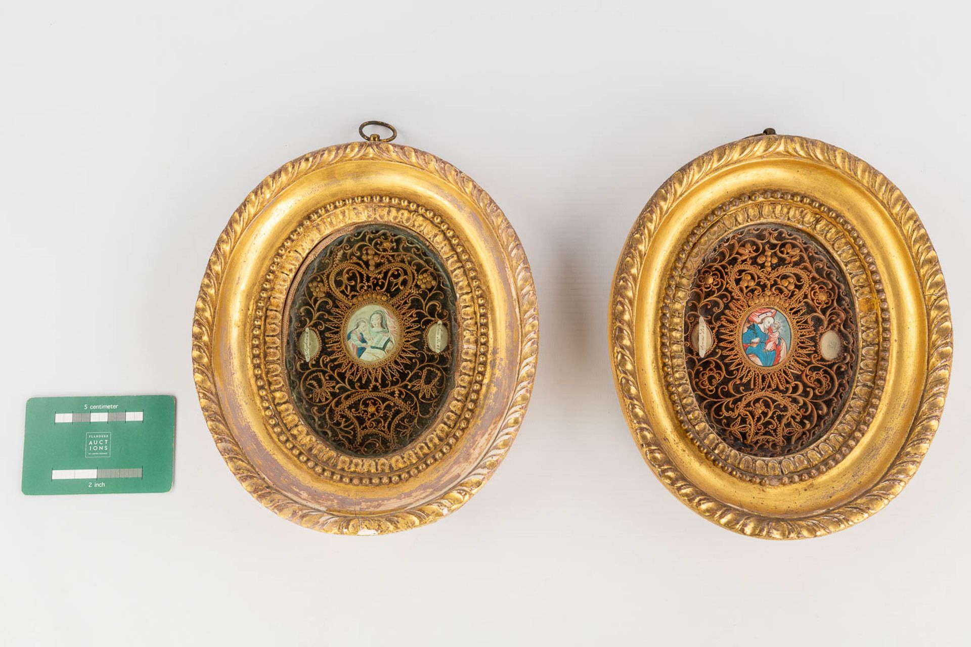 A pair of framed relics, decorated with images of Mary and Joseph with child. 19th C. (W: 19 x H: 23 - Image 2 of 18