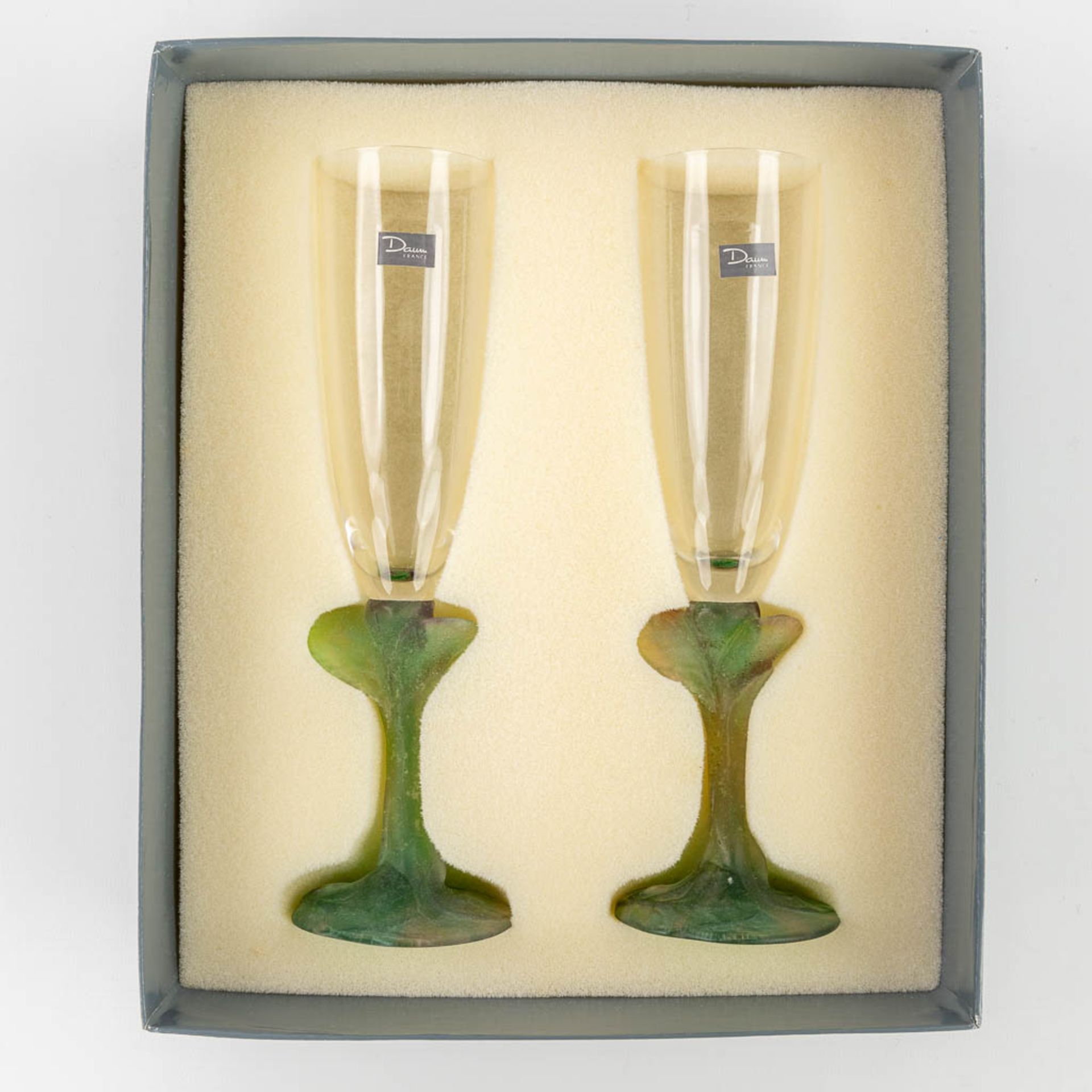 Daum France, 'Nature' a pair of champagne glasses in the original box. (H: 24 x D: 7 cm) - Image 5 of 13