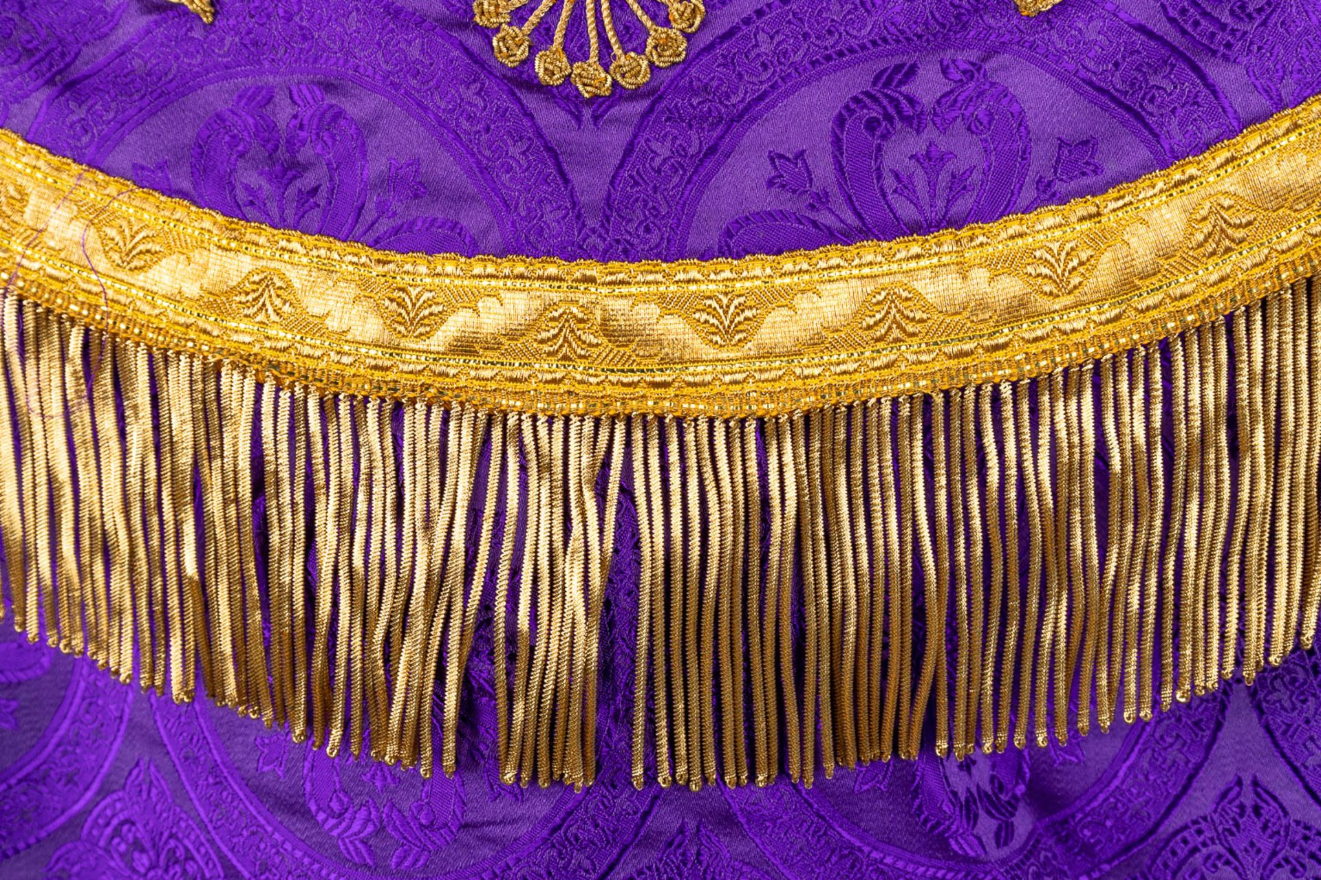 A Cope and Humeral Veil, finished with thick gold thread and purple fabric and the IHS logo. - Image 9 of 12