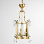 A hall lamp made of brass and glass. Circa 1970. (H: 67 x D: 36 cm)
