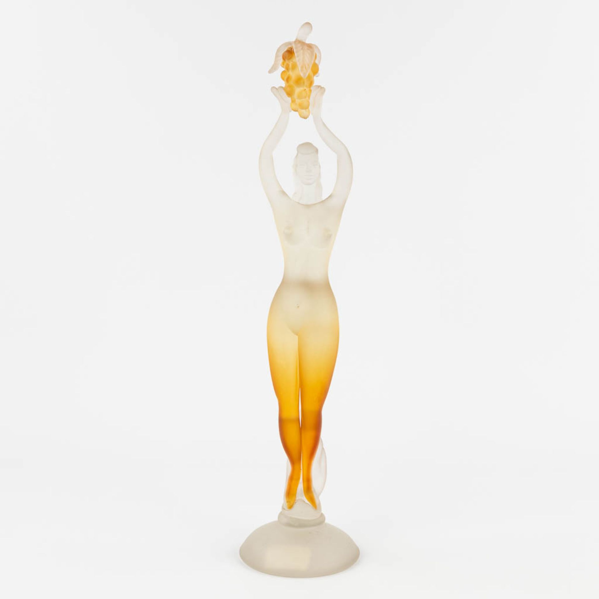 A female figurine holding grapes, Blown Glass, Murano Italy. (H: 50 x D: 11,5 cm)