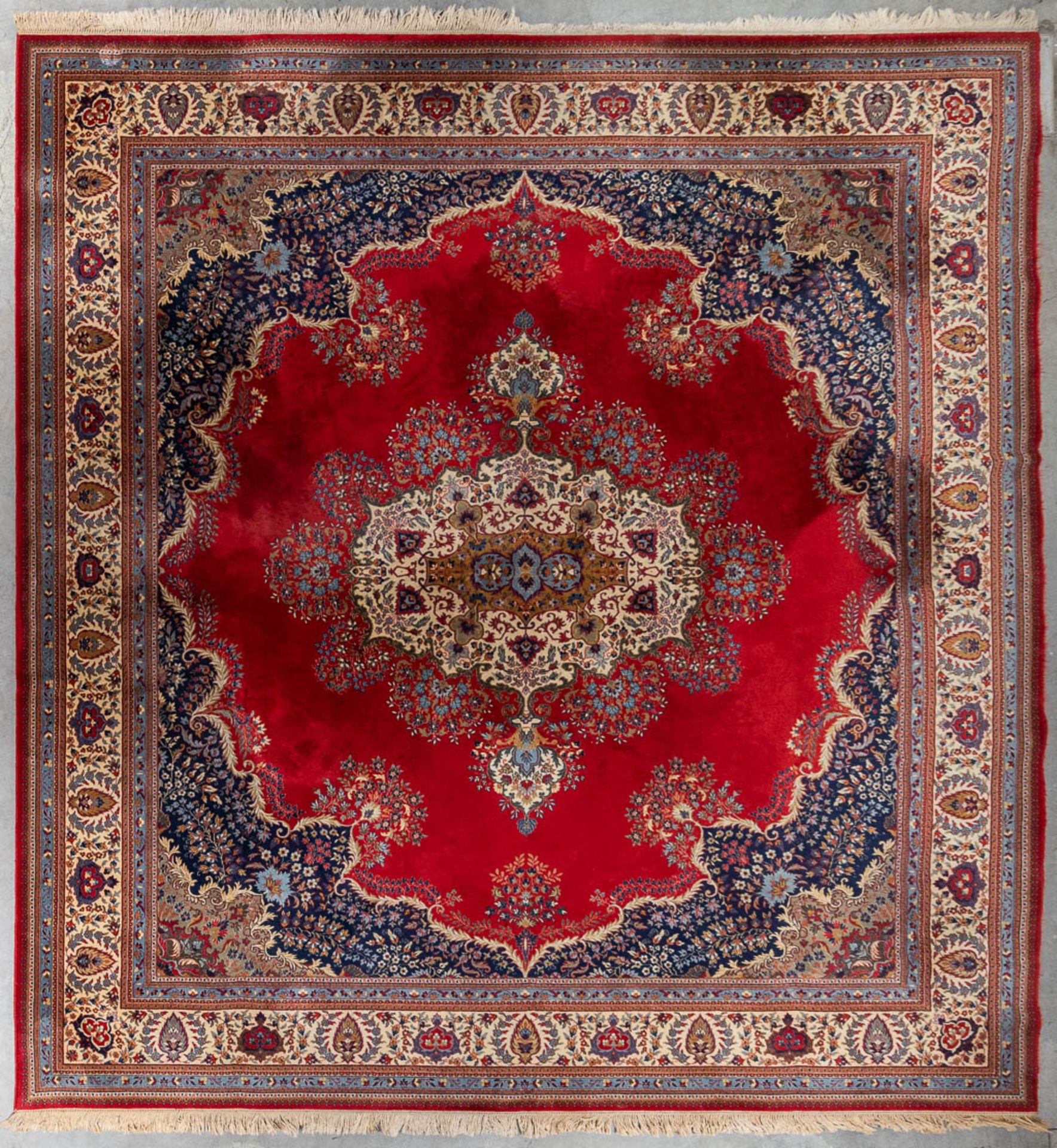 An Oriental carpet, Tabriz. (L: 432 x W: 412 cm)