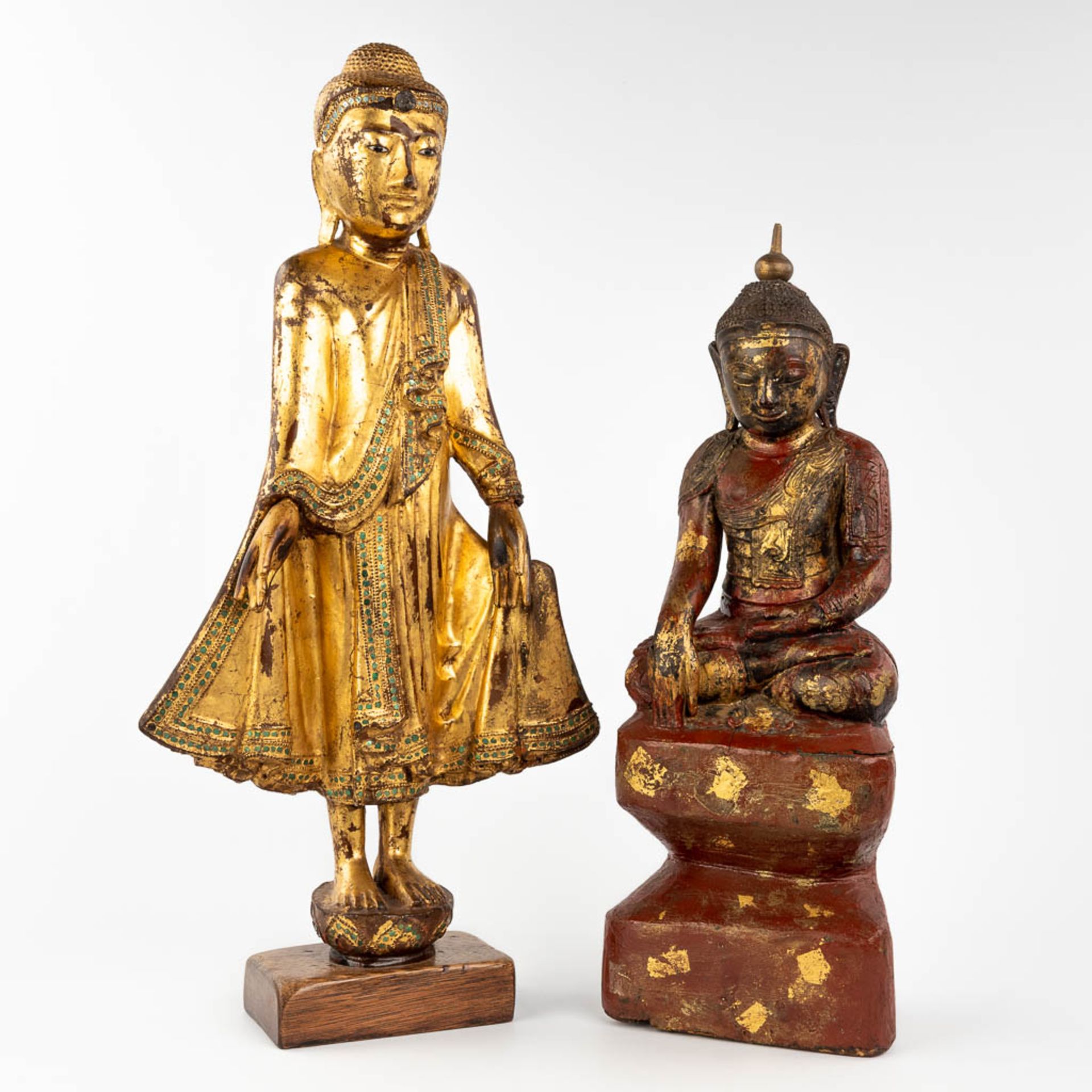A collection of two wood-sculptured buddha statues, 19th/20th C. (W: 29 x H: 60 cm)