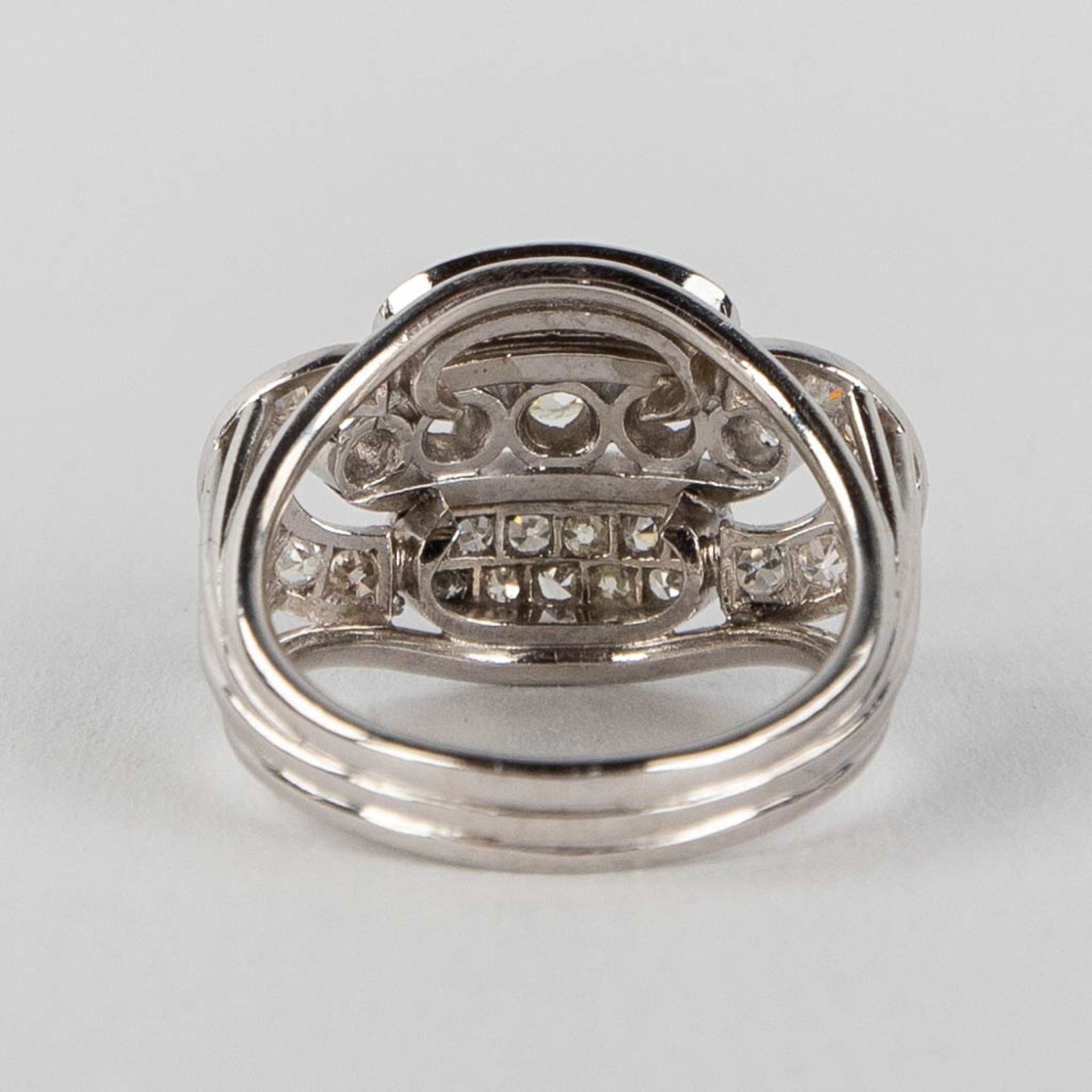 An antique ring with 5 larger and 36 smaller brilliants, in a platinum ring. 9,57g. size: 53 - Image 8 of 12