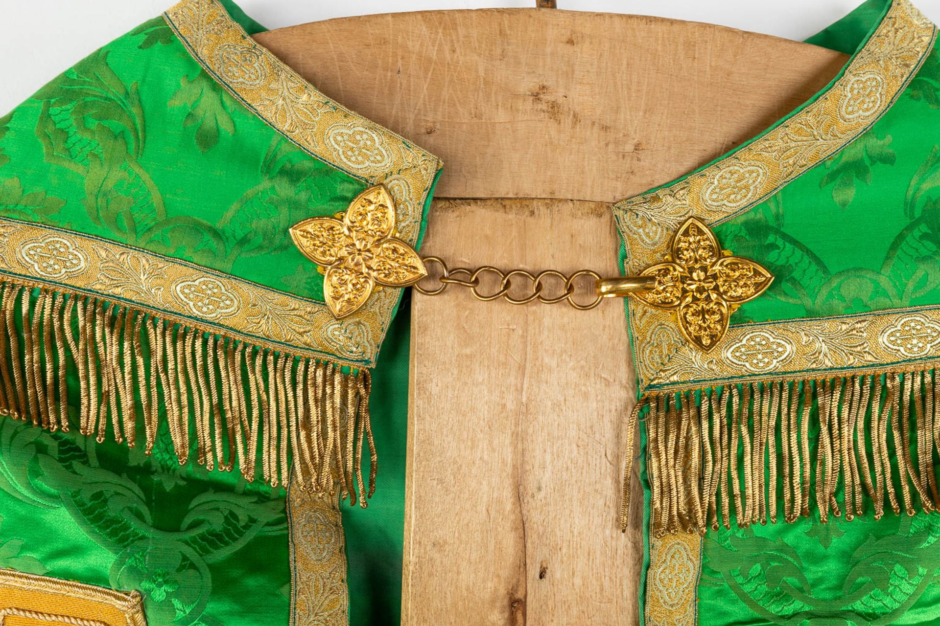 A Cope and Humeral Veil, finished with thick gold thread and green fabric and the IHS logo. - Image 7 of 14