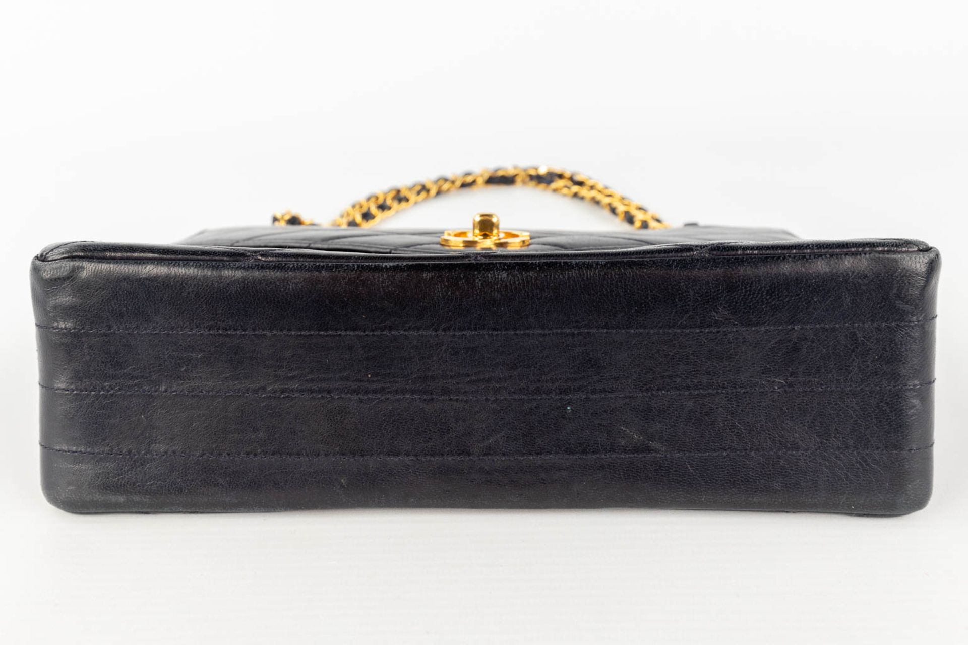 Chanel, a handbag made of dark blue/black leather with gold-plated hardware. Circa 1970. (W: 25 x H: - Image 9 of 18