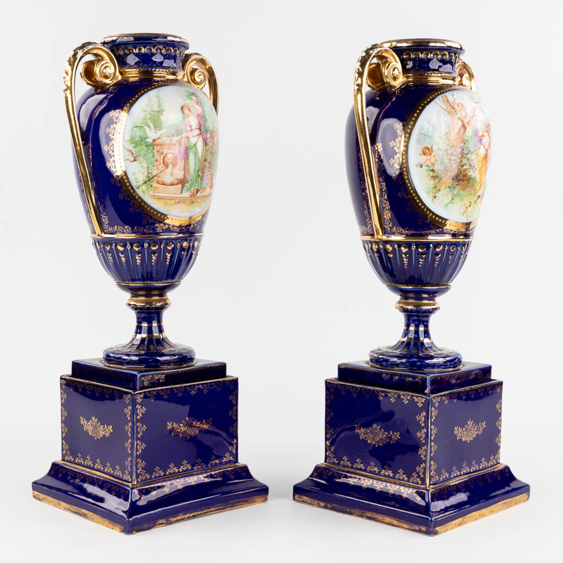 A pair of vases, with a transferprint decor. 20th C. (L: 18 x W: 18 x H: 50 cm) - Image 3 of 12