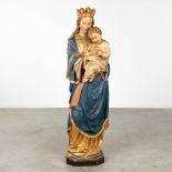 An antique wood-sculptured Madonna with child, original polychrome paint. 19th C. (L: 33 x W: 43 x H