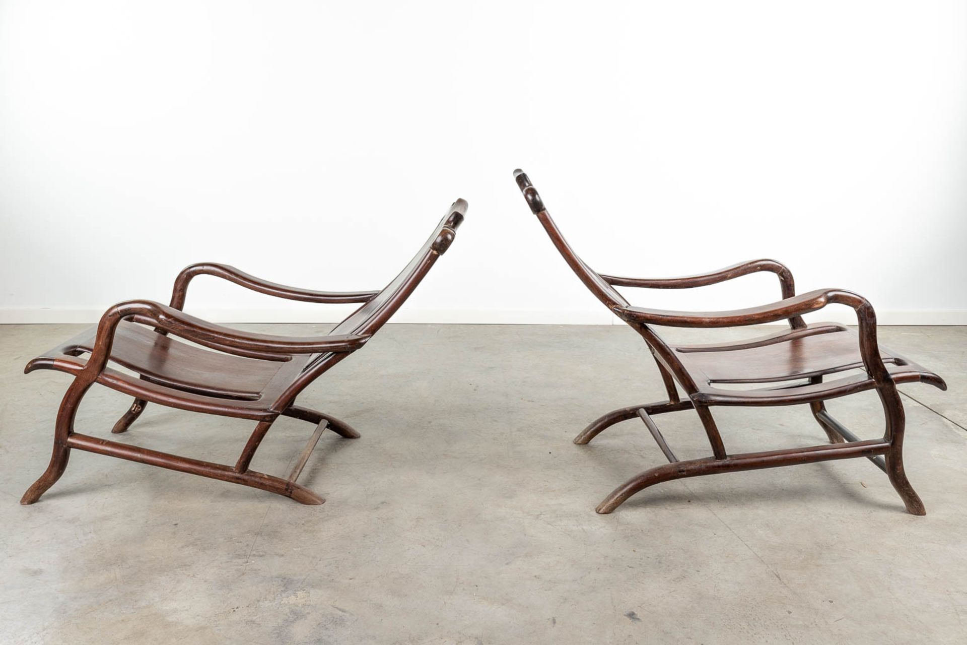 A pair of Chinese hardwood armchairs. (L: 100 x W: 57 x H: 78 cm) - Image 4 of 8