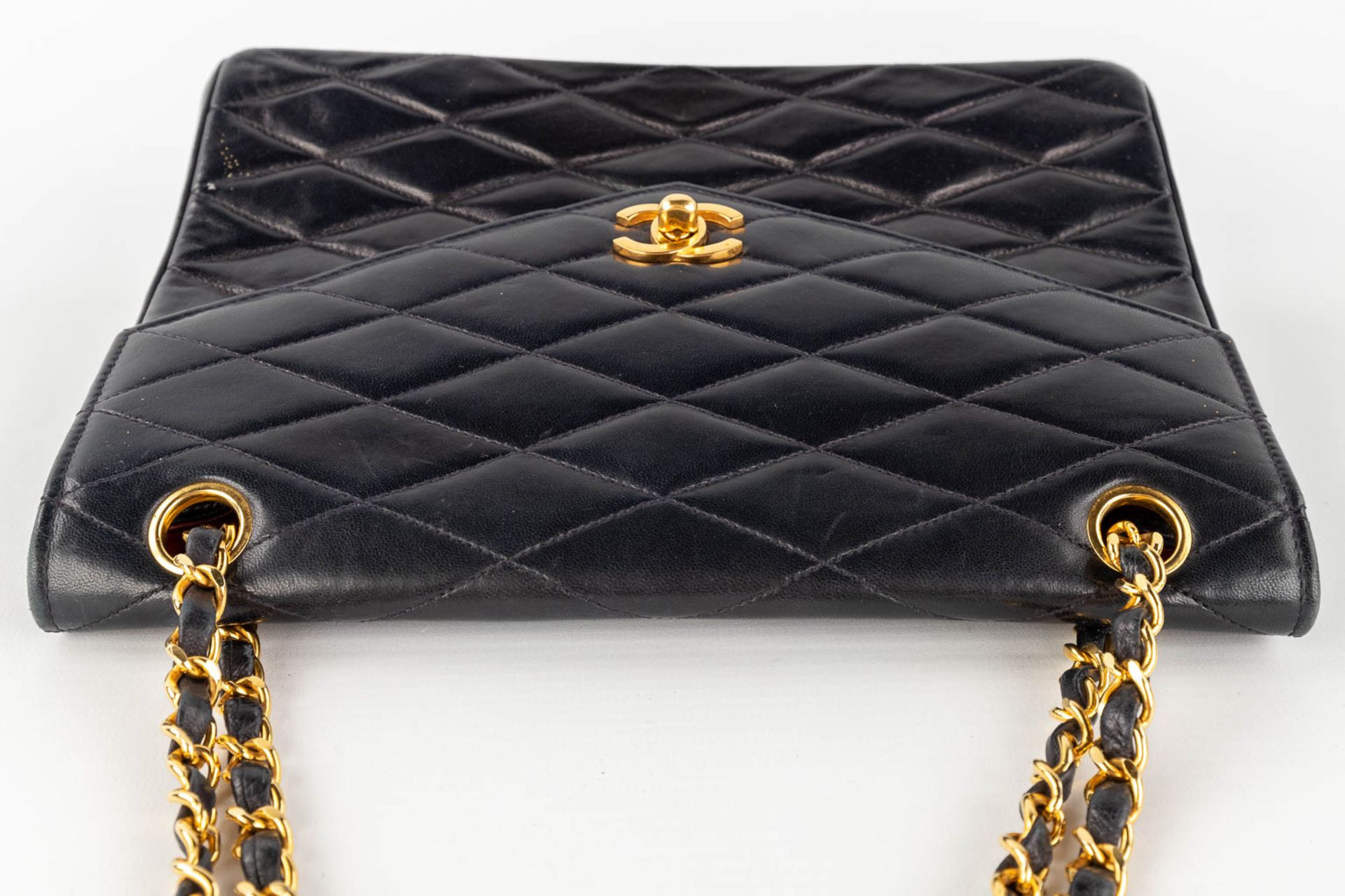 Chanel, a handbag made of dark blue/black leather with gold-plated hardware. Circa 1970. (W: 25 x H: - Image 10 of 18