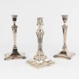 A collection of 3 silver candlesticks, of which 2 are a pair. (L: 13 x W: 14,5 x H: 29 cm)