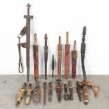 A large collection of swords and daggers of African origin. (H: 86 cm)