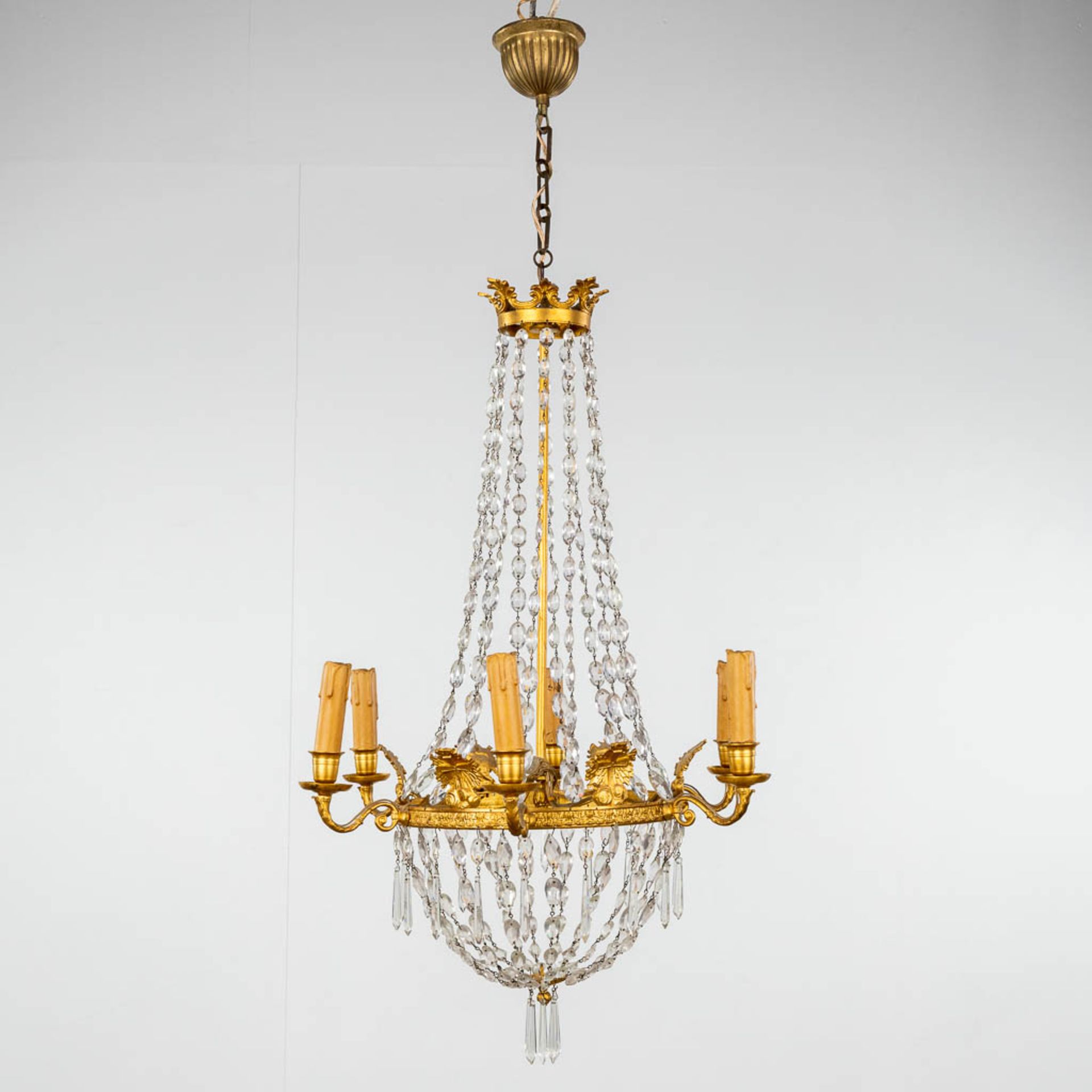 A chandelier 'Sac ˆ Perles', bronze and glass in empire style. 20th C. (H: 100 x D: 50 cm)
