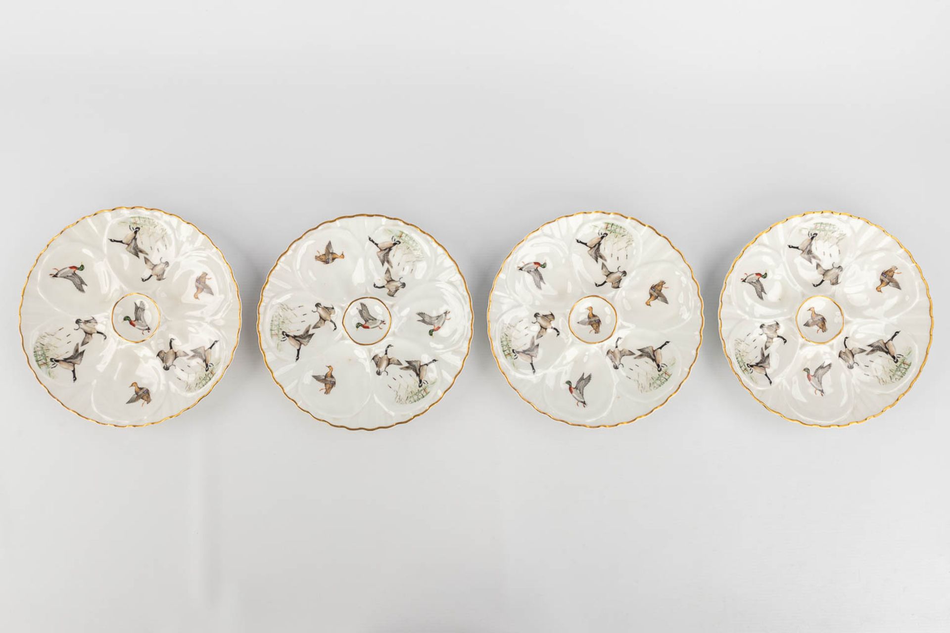 Porcelaine De Paris, France, a collection of 12 oyster plates decorated with birds. 20th C. (D: 23 c - Image 5 of 14
