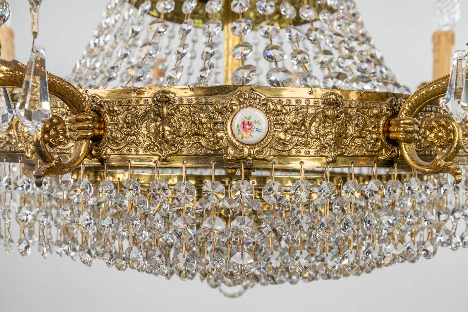 A brass and glass chandelier 'Robe ˆ Perles', finished with small porcelain plaques. 20th C. (H: 100 - Image 3 of 14
