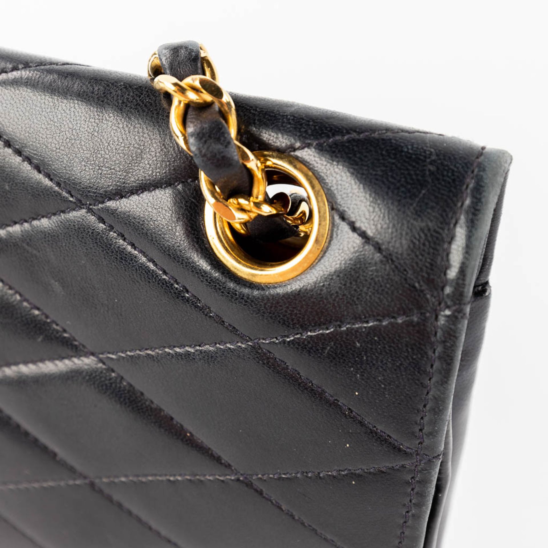Chanel, a handbag made of dark blue/black leather with gold-plated hardware. Circa 1970. (W: 25 x H: - Image 12 of 18