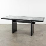 A desk, wood and glass, circa 1970. (L: 76 x W: 194 x H: 77 cm)