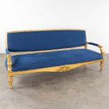 A large sofa, gilt sculptured wood upholstered with blue fabric. 19th C. (L: 74 x W: 225 x H: 100 cm