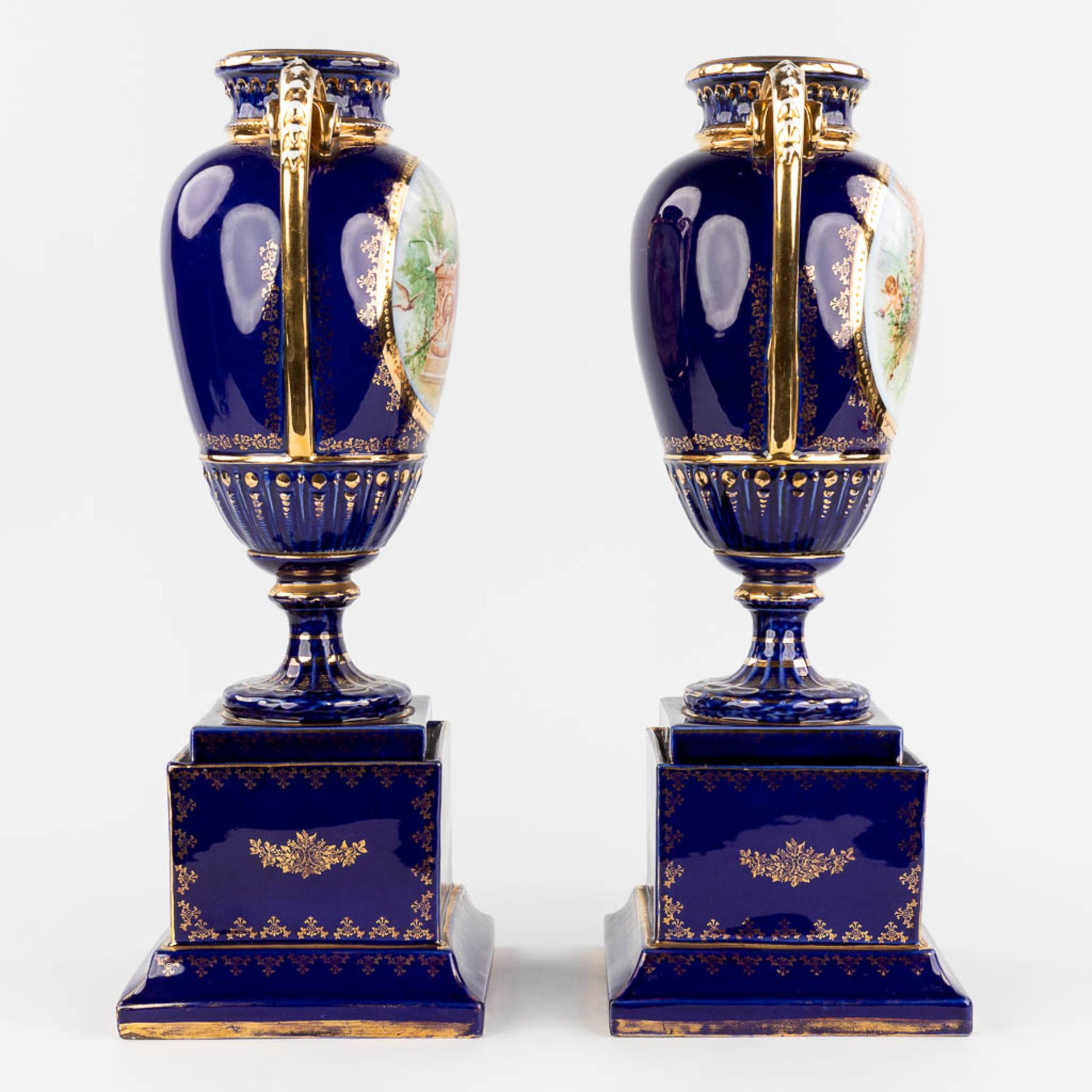 A pair of vases, with a transferprint decor. 20th C. (L: 18 x W: 18 x H: 50 cm) - Image 4 of 12