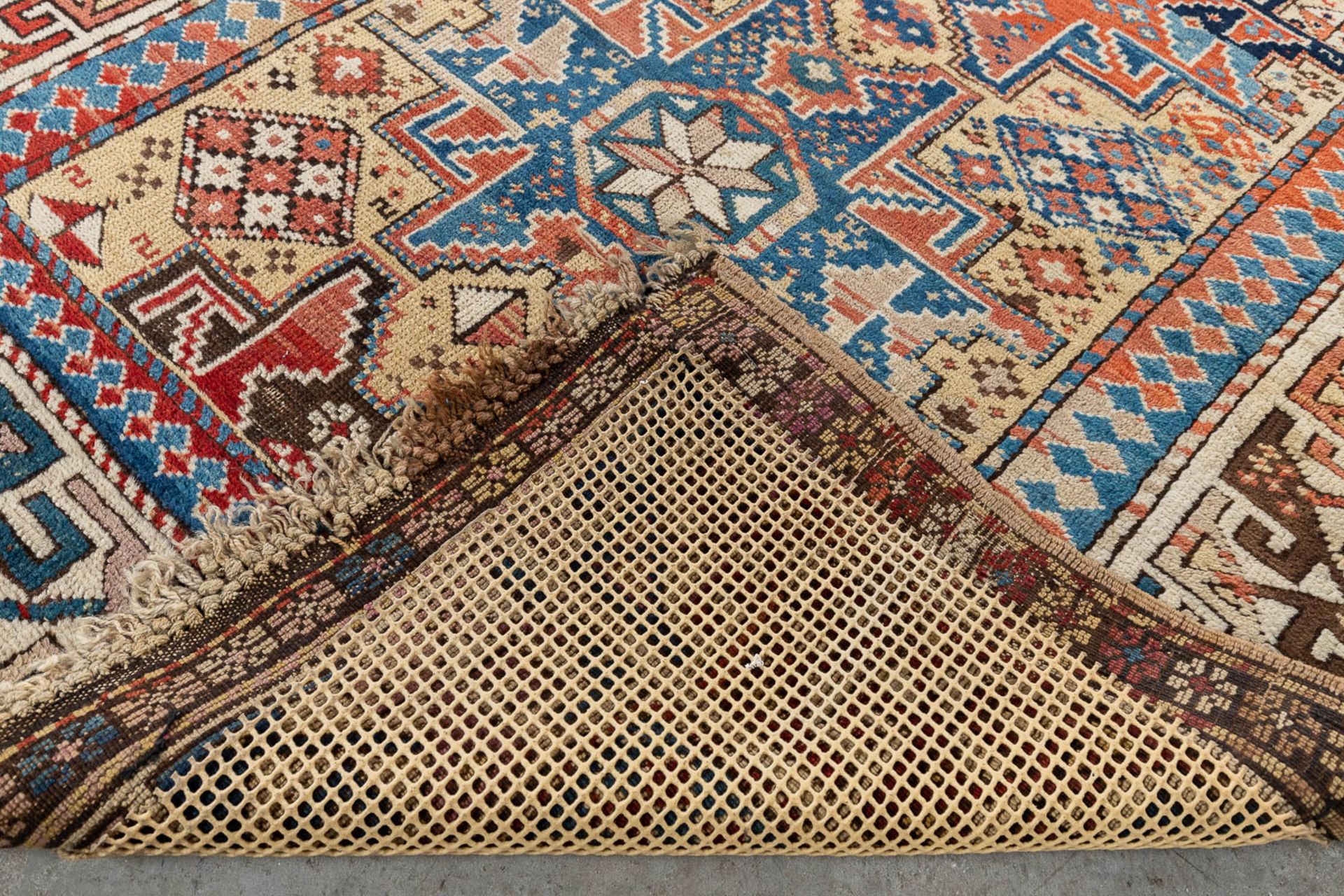 A collection of 2 Oriental hand-made carpets. Probably Caucasian. (L: 277 x W: 115 cm) - Image 10 of 12