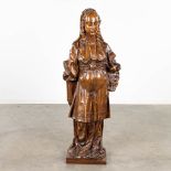 An antique wood sculpture, a figurine of a noble lady. 17th/18th C. (L: 30 x W: 53 x H: 123 cm)