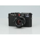 A Leica M6 Rangefinder Camera,