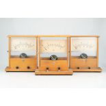 Three Russian wooden cased electric gauges,