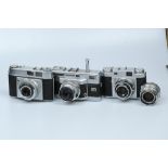 Three 35mm Cameras,