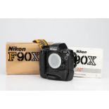 A Nikon F90X 35mm SLR Camera,