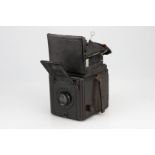 A Butcher's Popular Pressman SLR Camera,