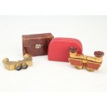 Two Pairs of Compact Gold Binoculars,