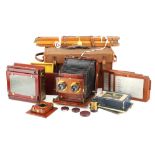 A Thornton Pickard Ruby Stereo Mahogany & Brass Folding Camera Outfit,