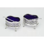A cased pair of Victorian silver table salts,